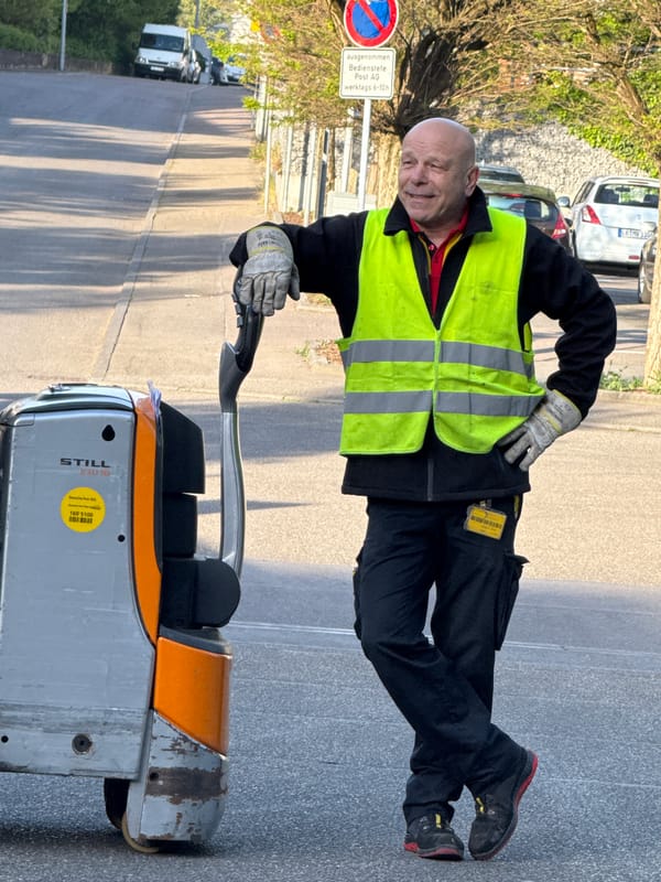Postal worker photographed with equipment in Bietigheim-Bissingen