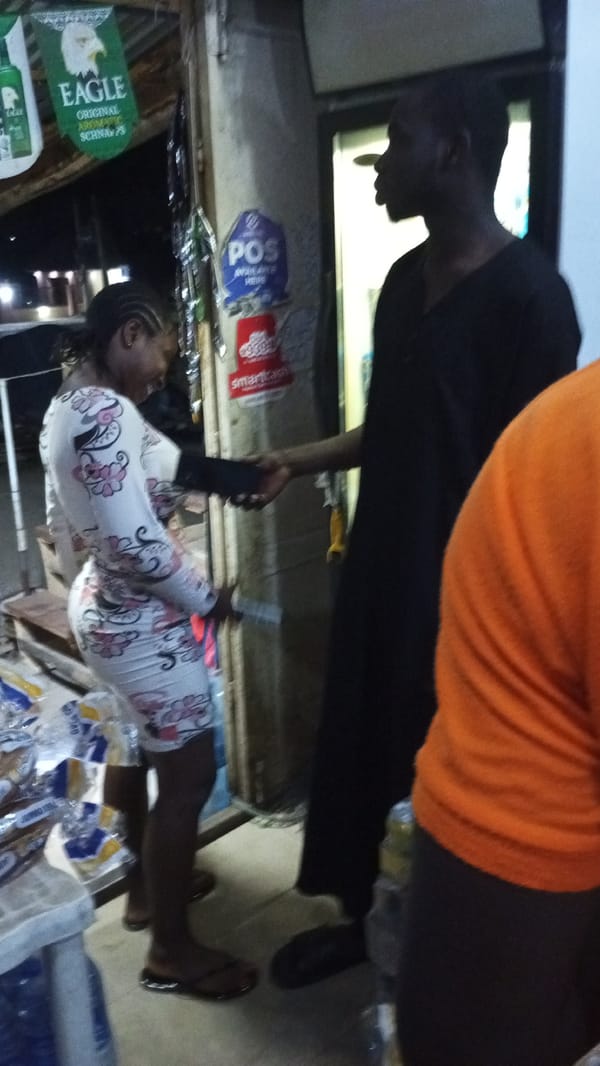 Evening shoppers conduct business at Adankolo Nigeria store