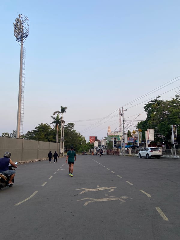 Morning activity around a stadium in Margorejo, Indonesia