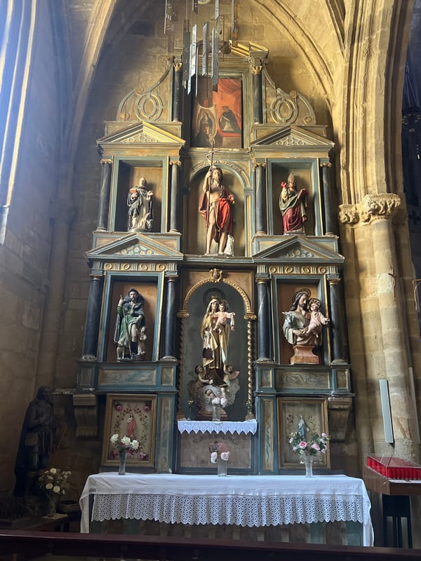 Church and restaurant scenes in historic Getaria, Spain