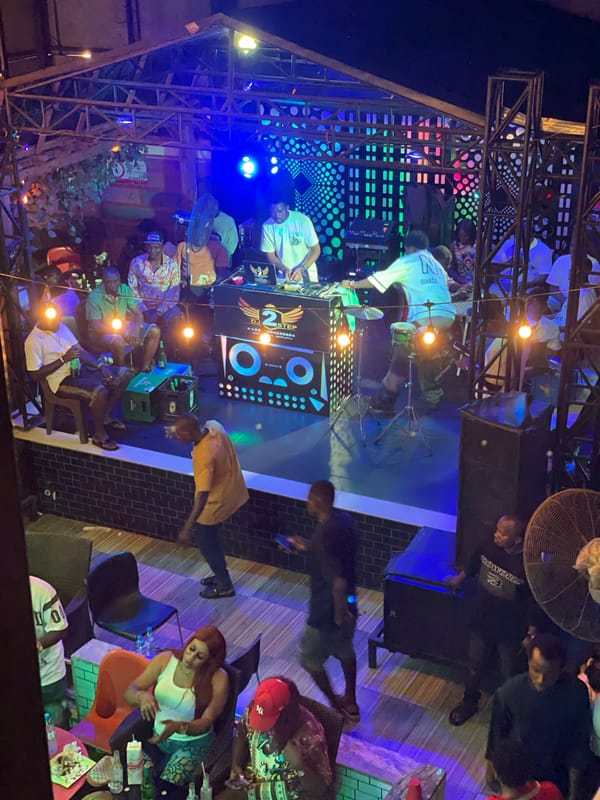 Live night at 2 Step Bar, Obosi — DJ, performers, full crowd