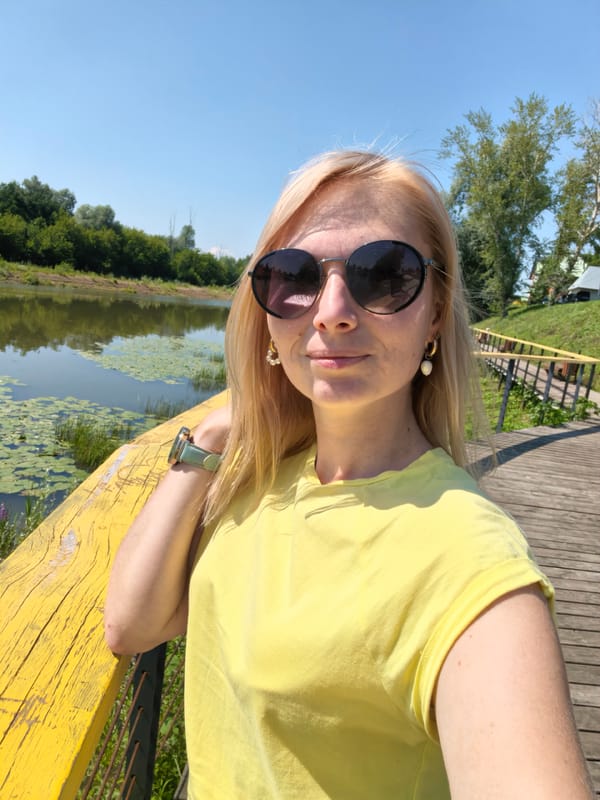 Boardwalk selfie beside a lily pad-covered waterway in Sterlitamak