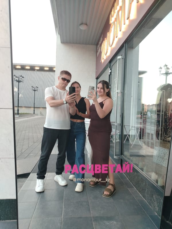 Casual selfie session outside a Karaganda building