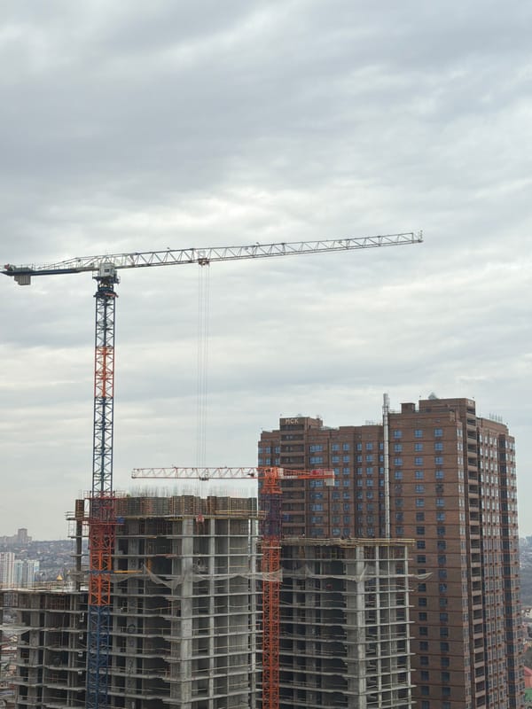 Tower cranes active at construction site in Novoalexandrovka