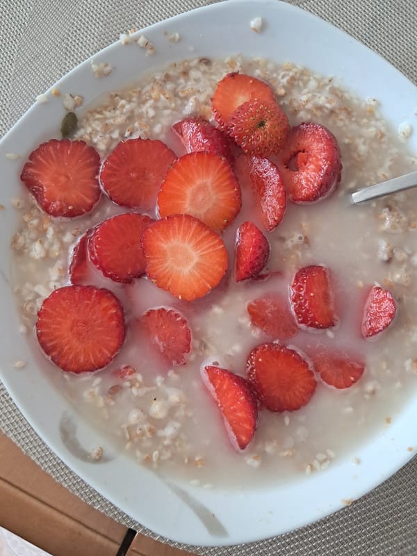 Overhead shots of two simple breakfast dishes, oatmeal and buckwheat