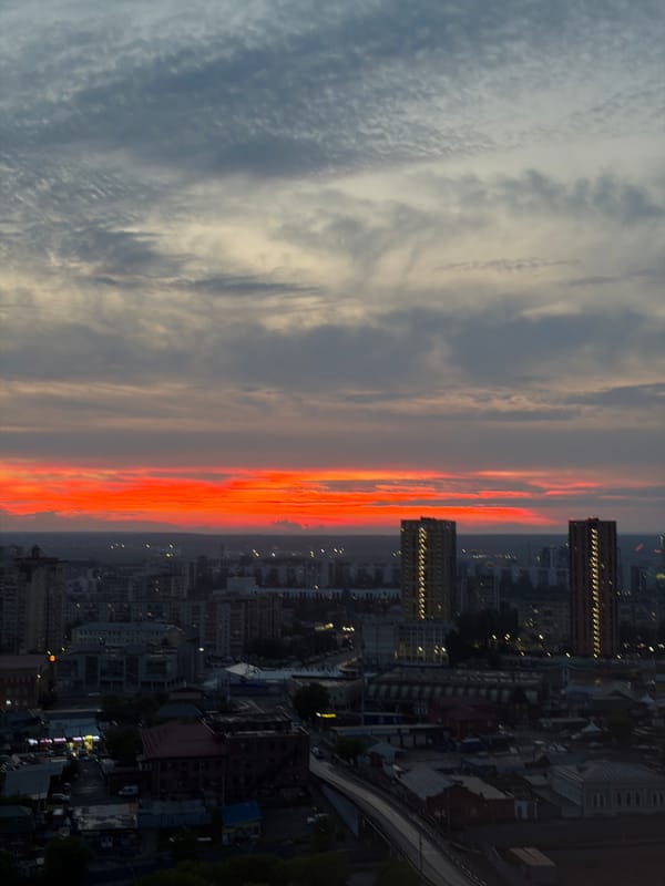 Dramatic sunset colors captured over Perm, Russia cityscape