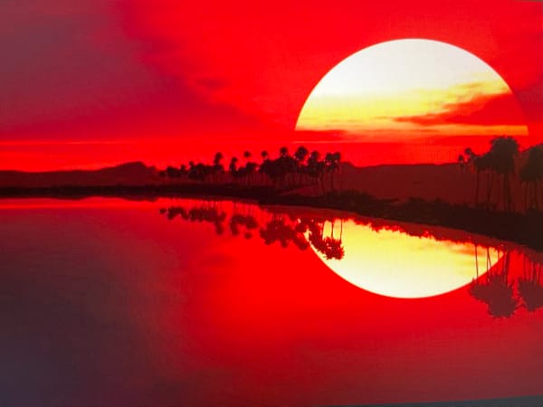 Fiery sunset over water on the Kharkiv horizon