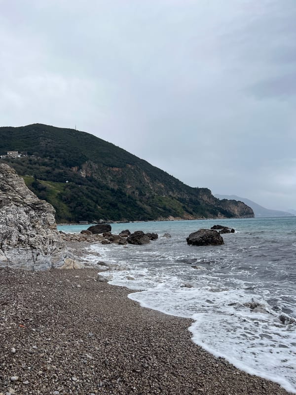 Overcast coastal scene captured at Prijevor Montenegro pebble beach