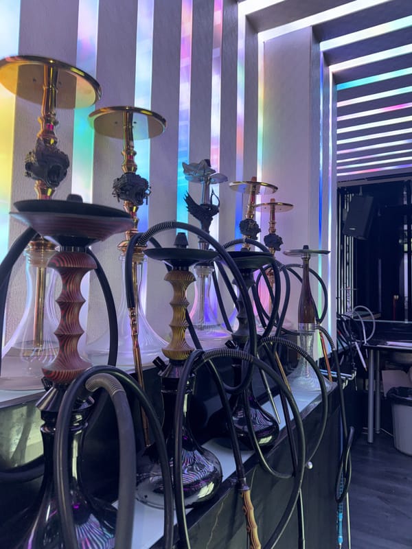 Ornate hookahs displayed in dimly lit Blagoevgrad setting