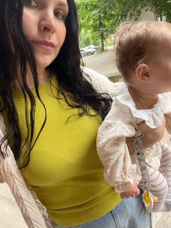 Tender moment with a baby, shot low-angle in Voronezh