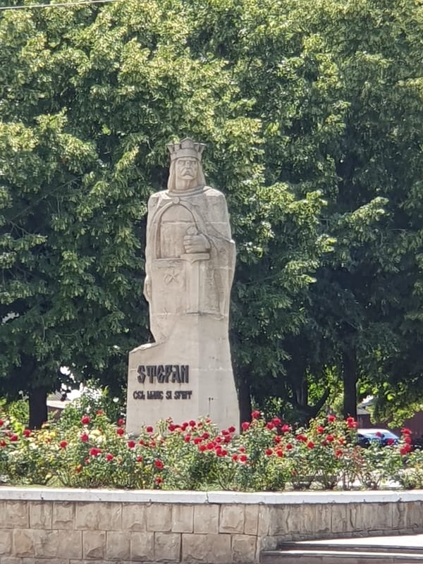 Royal statue, telecom ad, and a Casio watch in Romania
