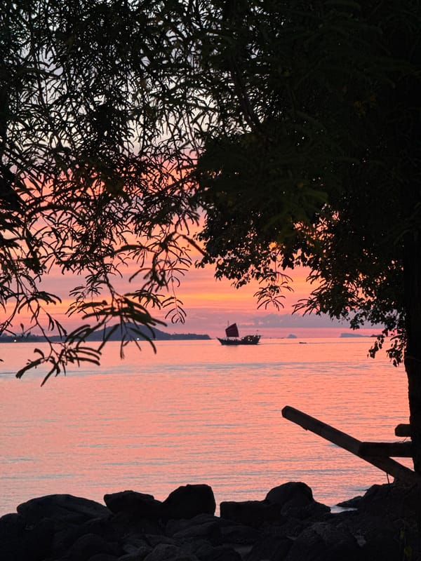 Sunset scenes along the Baan Plai Laem shoreline