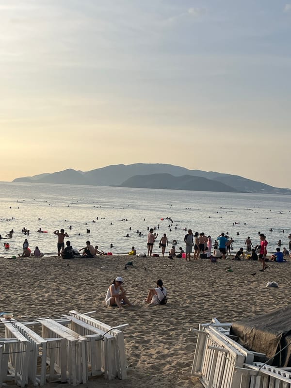 Crowded evening beach scene documented in Nha Trang Ward