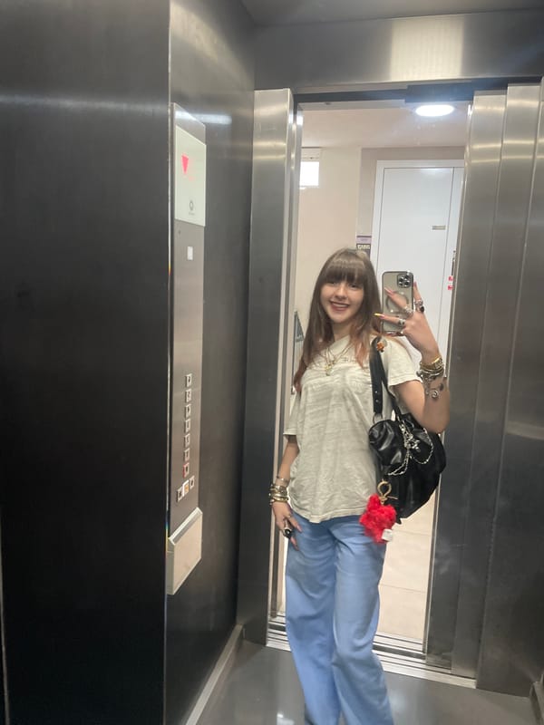 Woman takes selfies in elevator and outdoors in Raanana