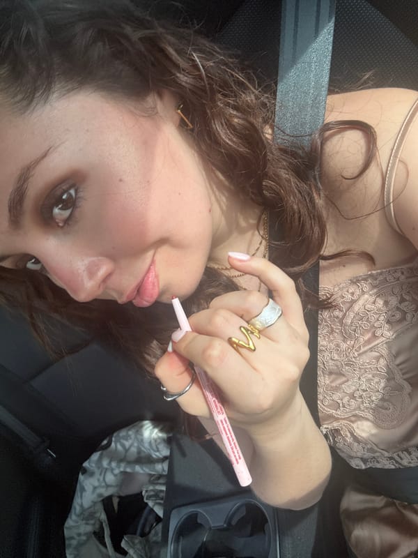 Woman applies makeup in car, Santa Clara Ocoyucan