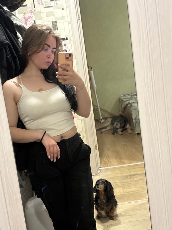 Woman and child share quiet moment indoors in Izhevsk