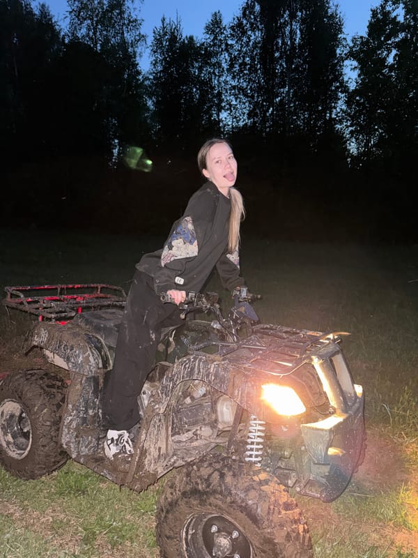 Woman on muddy ATV spotted in Russian woods