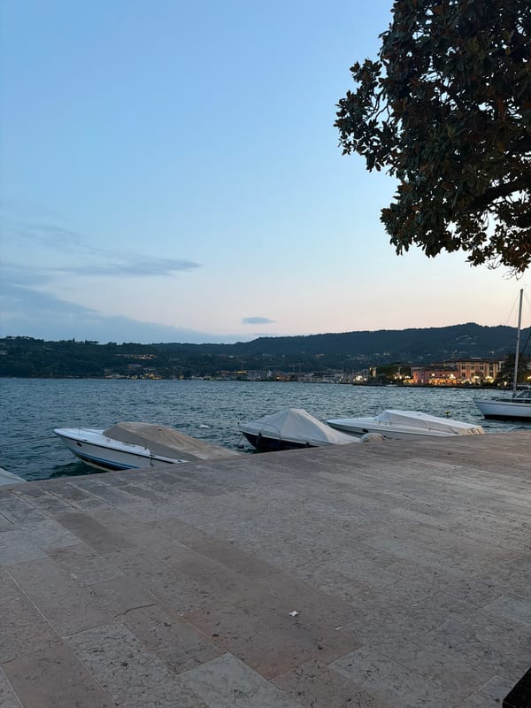 Dusk stroll along Salò's boat-lined lakefront promenade