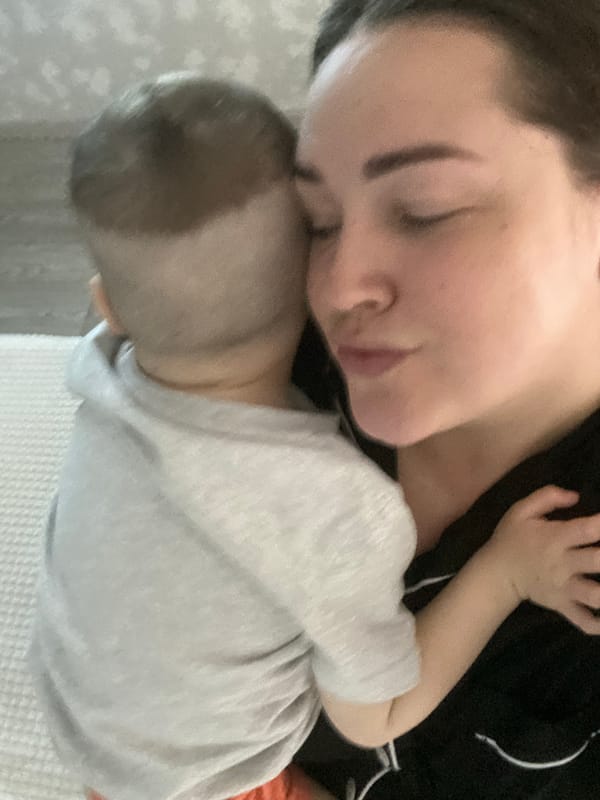 Tender moment captured between adult and child in Sochi