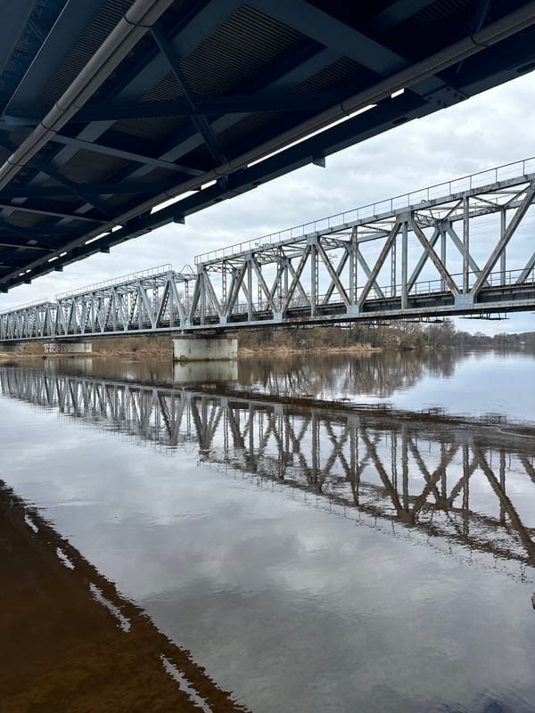 Bridge and boat scenes captured along Carnikava waterway