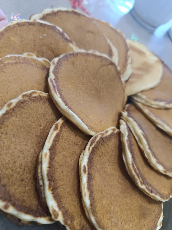 Stack of pancakes documented in Simferopol morning scene
