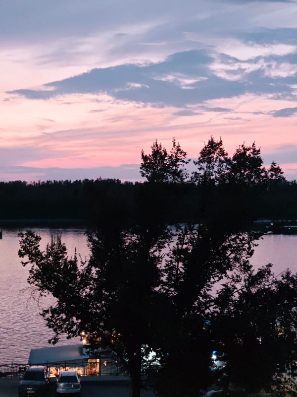 Dusk scenes: water, streets, and outdoor dining at twilight