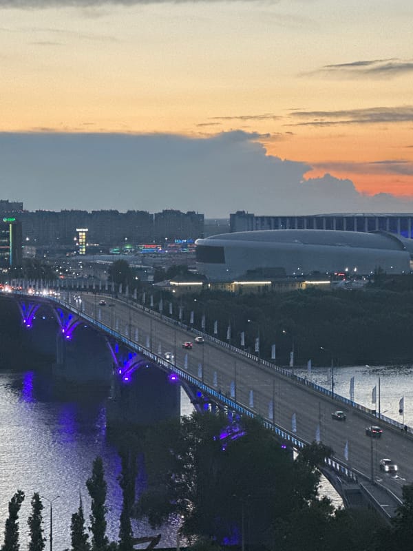 Kanavinsky Bridge glows under a Nizhny Novgorod dusk sky.