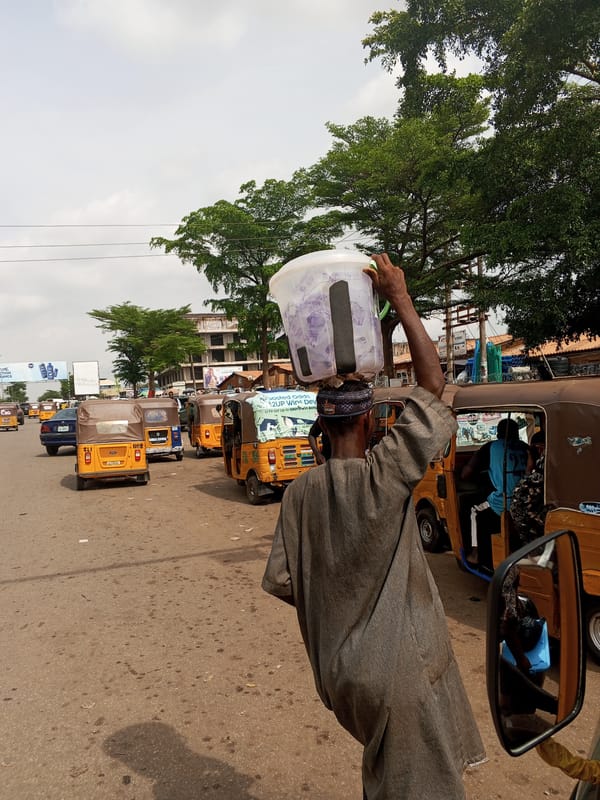 Street vendors conduct daily business in Abuja marketplace