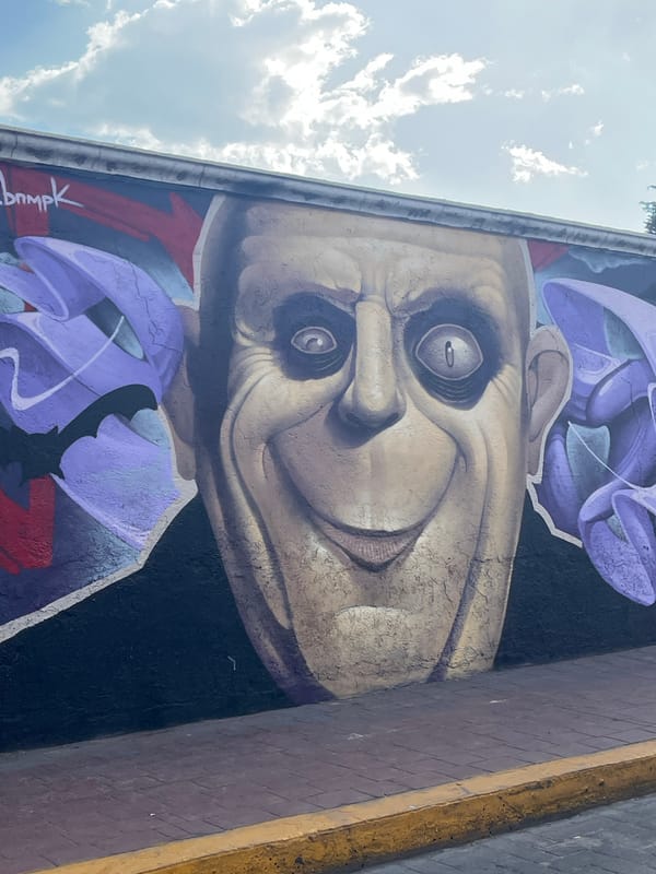 Uncle Fester mural spotted on Mexican street wall