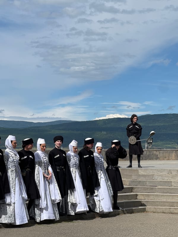 Traditional Georgian cultural gathering at Tbilisi cathedral and overlooks