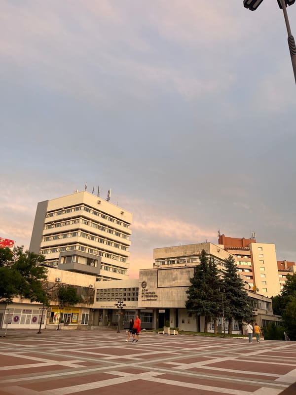 Dusk at a city plaza near the Nikola Vaptsarov Drama Theatre