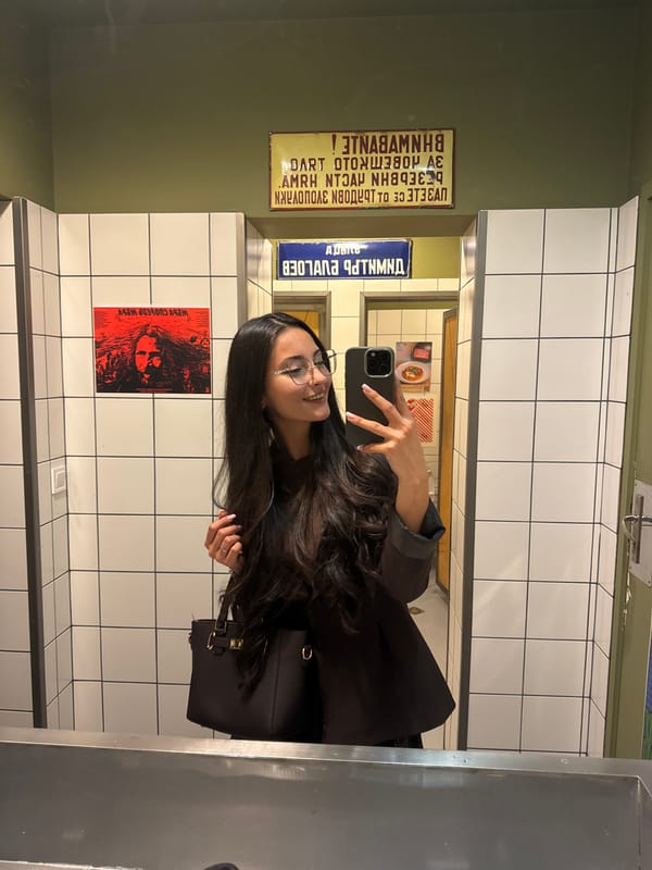 Woman takes mirror selfie in Sofia, Bulgaria