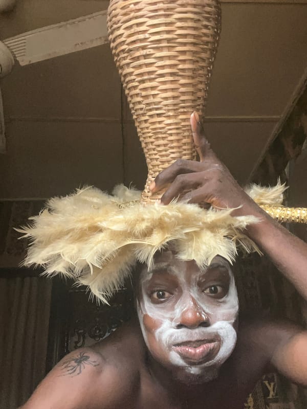 Traditional white face painting ceremony documented in Nigerian communities