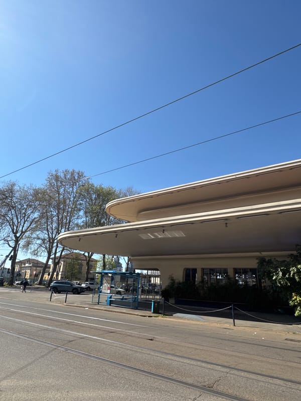 Morning street scenes documented in Milan's Viale Carlo Espinasse area