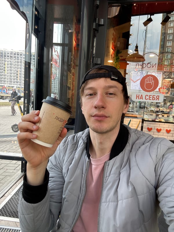 Man takes morning coffee selfie in Murino, Russia