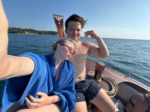 Tourists enjoy boat trip at Karon Beach, Thailand