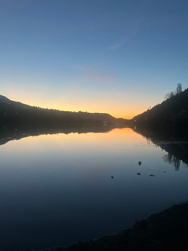 Sunset reflected on lake waters in Pancharevo, Bulgaria