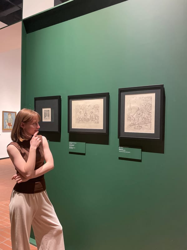 Woman visits Perm Art Gallery, takes selfies while viewing exhibits
