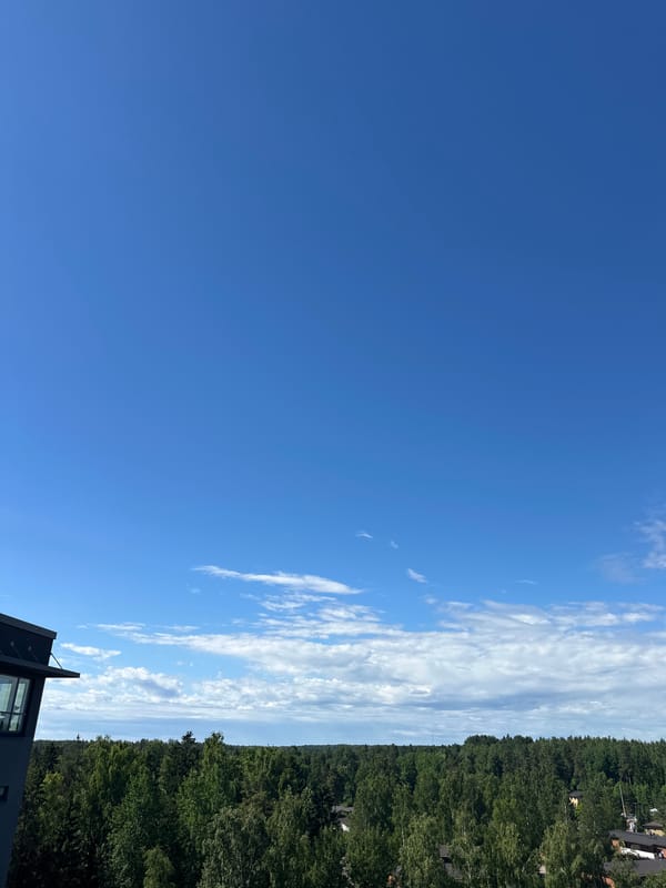Morning skies, forest canopies, and apartment buildings from above