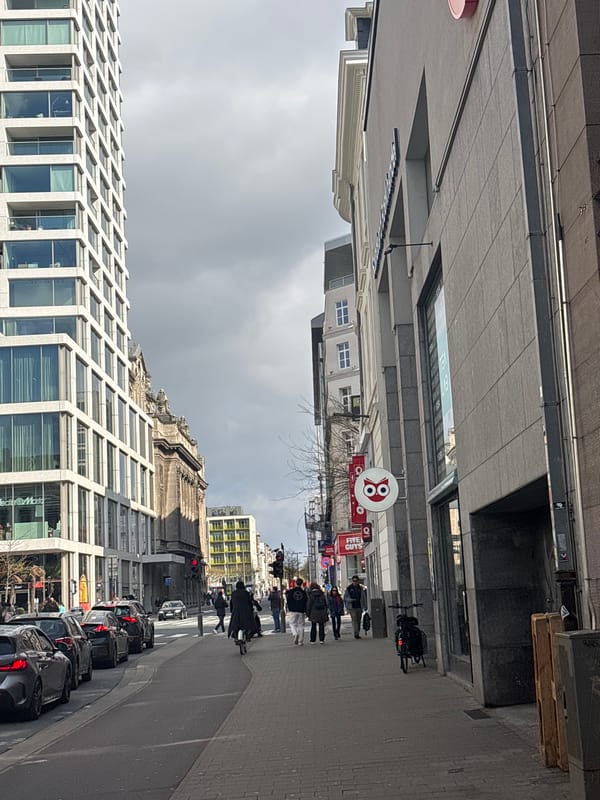 Morning pedestrian activity observed on Antwerp sidewalk