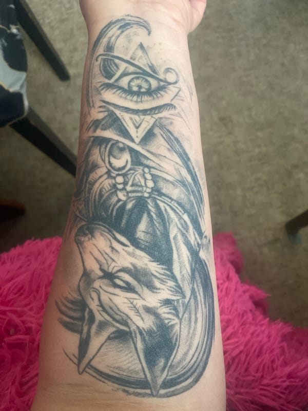 Personal tattoo and domestic cat moments documented in Artyom