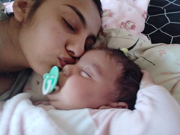 Mother-baby bonding moments captured in decorated nursery space
