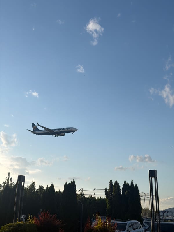 Aircraft land at Otopeni Airport during sunset hours