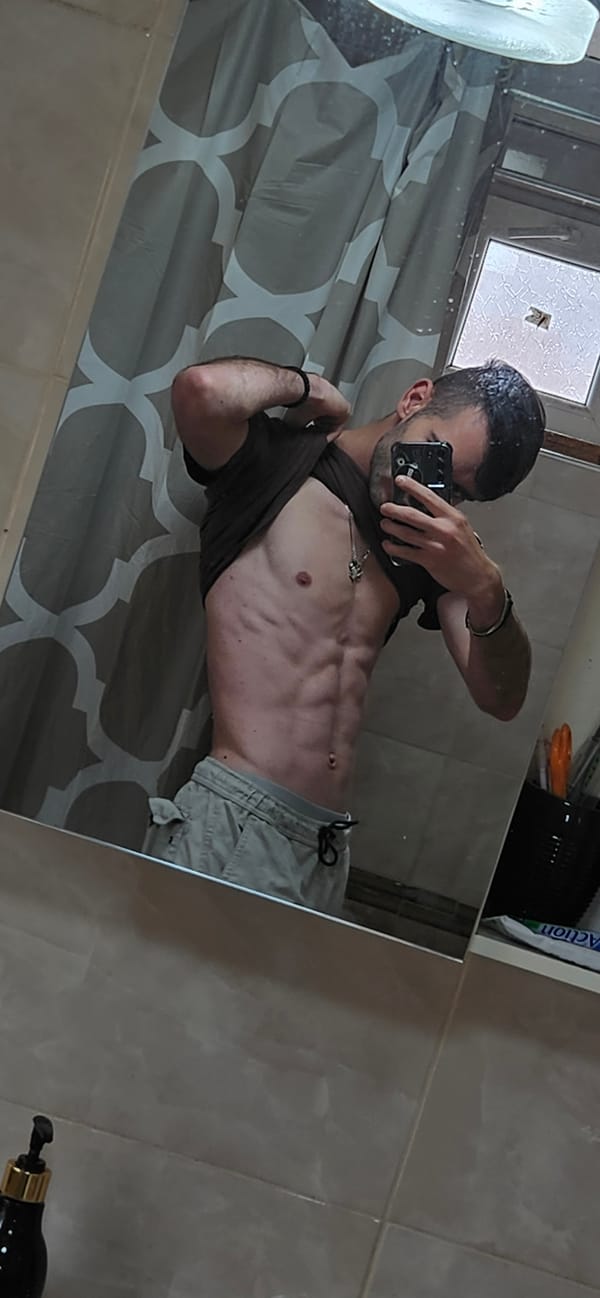 Man Documents Self-Photography Session in Bulgarian Bathroom