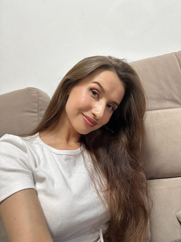 Woman rests on sofa in Yekaterinburg indoor setting