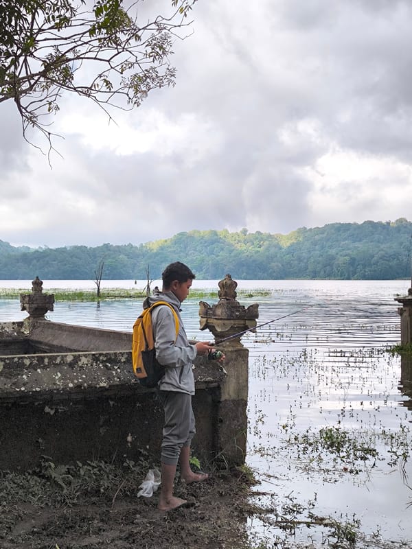 Morning fishing and camping activities observed at Bali's Lake Beratan