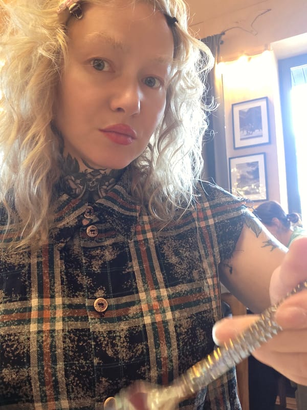 Lunch out at a Sosnoviy Bor restaurant, burgers and pasta on the table