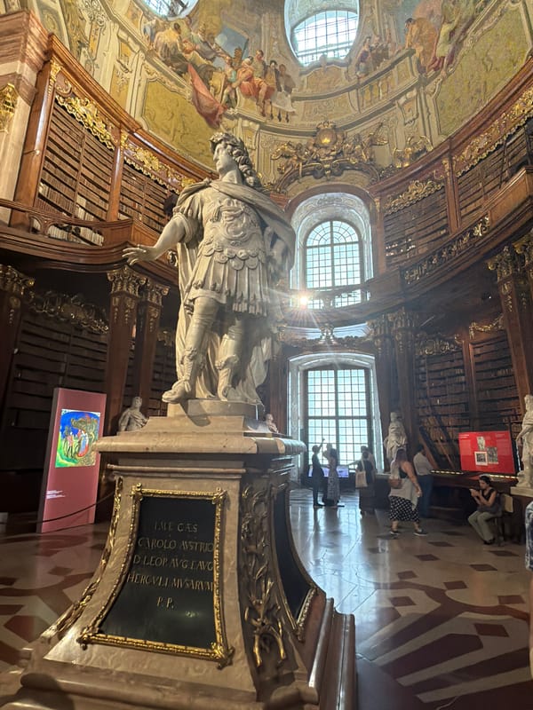 Inside Vienna's ornate Baroque State Hall at the National Library