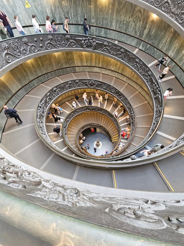 Visitor documents Vatican museum artifacts and sculptures