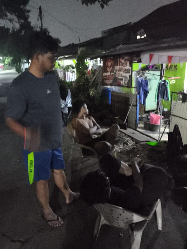 Late-night hangout in Depok: bonfires, scooters, and backstreet vibes